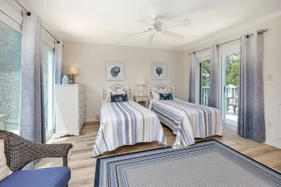 Stones throw from shore!  Spacious multi-level townhome one row back from beach