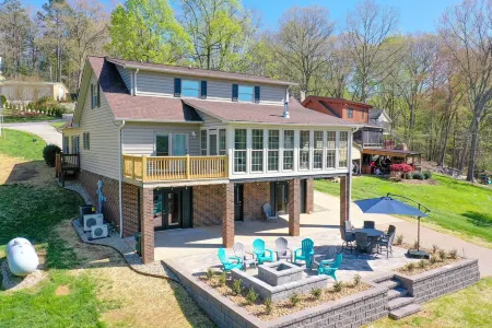 Pristine lake house offering watersports, gameroom favorites, and stunning view