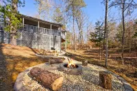 New Listing! Couples retreat- swing bed-hot tub-fire pit-putt putt Hotels near Tennessee Legend Distillery - Winfield Dunn Parkway