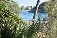 Villa mit Direktem Strandzugang zu Einer Sandigen Bucht in Cala D'or Zentrum Hotel a Cala d'Or