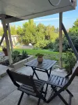 Private apartment with a green backyard