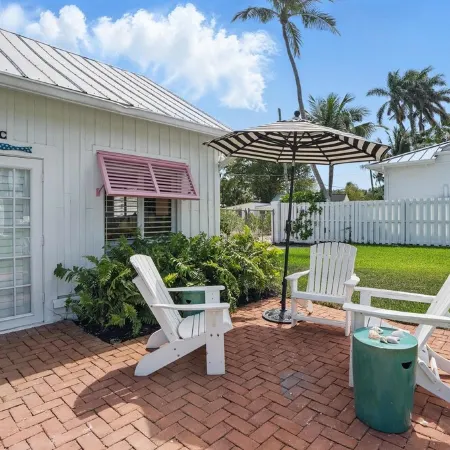 The Historic Coquina Cottages C is 2 Blocks to the Beach, 5th Avenue and 3rd St.