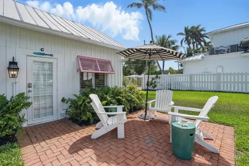 The Historic Coquina Cottages C is 2 Blocks to the Beach, 5th Avenue and 3rd St.