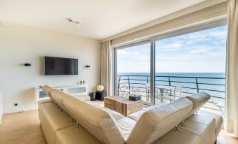 Apartment by Zeedijk with Sea View