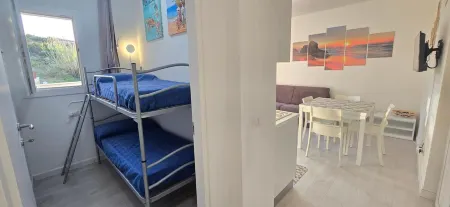 Casa Lilly with private garden Отели в г. Lu Bagnu