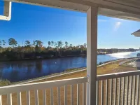 Scenic Balcony and Community Amenities - Charming Coastal Haven
