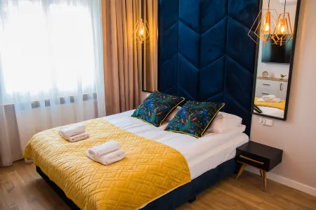 Miedziany by Rentoom Отели рядом с достопримечательностью «Дом Николая Коперника»