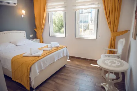 Bozcaada Aspava Otel Отели в г. Бозджаада