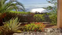 Nice studio, spacious, air-conditioned, near village, sea view in small residence.