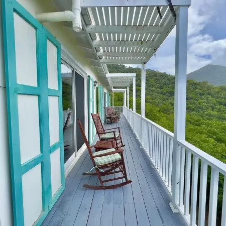 Quiet hillside villa with expansive sea, beach, and mountain views...