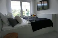 Apartments- Saaldorf WG 6 with balcony and view of the reservoir