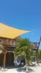 Seculuded beachfront home, outdoor showers, rooftop deck, 360 island view