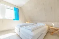 Vacation home in a unique location at the foot of the dunes