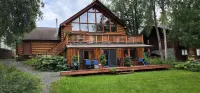 Close to Soldotna, large home on the Kenai River.  Sleeps 15, 7 bedrooms, 6 bath
