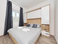Modern apartment for 2-4 persons with garden view and pool use