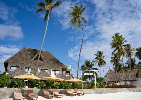 Alladin Boutique Beach Hotel and Spa Zanzibar Отели рядом с достопримечательностью «Мнемба»