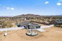 Bocce PoolSpa Game Room Firepit Modern Oasis Yucca Haven by AvantStay