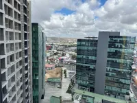 Cozy 1-bedroom condo with WiFi, fitness room in cool Tijuana