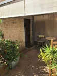 In the heart of St Florent apartment le Colombier with small courtyard 10 mn from A71