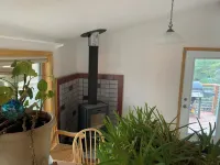 1 bed, 1 bath, breakfast included, full kitchen, washer/dryer, and rental car.