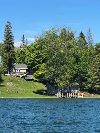 Darling cabin on Lake Huron in the beautiful Les Cheneaux Islands of Cedarville.
