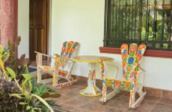 Private suite 103 with beautiful gardens, shared pool and BBQ area!