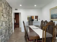 Spacious 4-bedroom house in tranquil Downey with AC