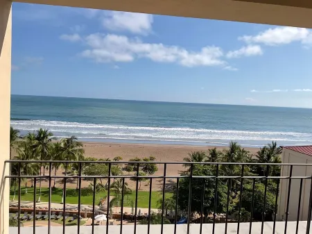 Breathtaking ocean views from every room in this 2-bedroom beachfront condo