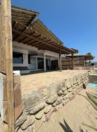 Spacious 4-bedroom house with WiFi, AC in welcoming Punta Sal Отели в г. Пунта Саль