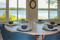 Riverfront Basecamp to Boat Fish Chase Sunsets - 3-Star