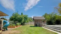 3-bed/2 bath basement apt. in charming Midvale with AC, wifi, laundry & hot tub.