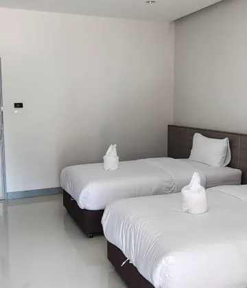 ห้องดีลักซ์เตียงแฝดพร้อมวิวท่าเรือเก่า