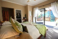 Tube n Axe Lodge and Backpackers Hotel a Stormsrivier