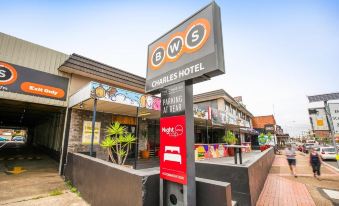 "a hotel entrance with a sign that reads "" bws charles hotel "" prominently displayed on the building" at Nightcap at the Charles Hotel