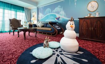 The room is decorated with large windows and an enormous bed in the middle at Hong Kong Disneyland Hotel