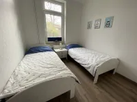 Vacation apartment "Kleine Möwe" with large garden in the heart of Pilsum