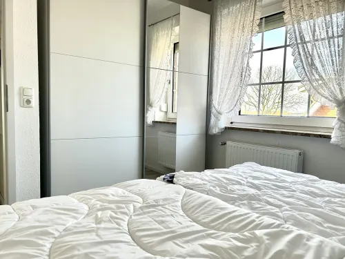 Apartment with a view of the dyke for up to 4 people. -Turquoise