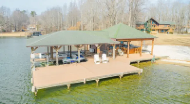 Huge Lakefront Home with private hot tub, dock, and pickle-ball court