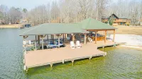 Huge Lakefront Home with private hot tub, dock, and pickle-ball court
