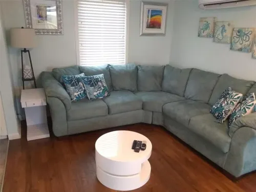 Beach and river view cottage with deck and specatuclar views.