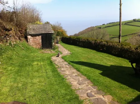 Parsonage Farm Stables, with stunning views down to the sea