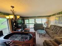 2 Br Condo on resort Property access to members benefits pool/hottub/golf cart