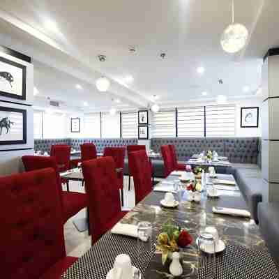 Belanova Apartments and Suites Dining/Meeting Rooms