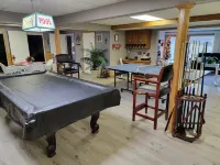 Building Memories & Relationships enjoy stocked pond, woods, game room, and more