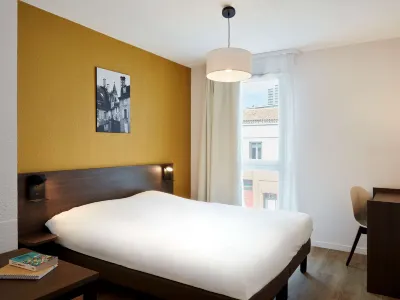 Aparthotel Adagio Access Poitiers Hôtels à proximité de : Auchan Hypermarché Poitiers Sud