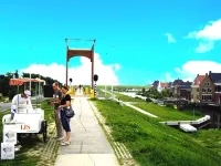 6 Pers. Holiday Home Aurora with Directly on the Lauwersmeer - WiFi