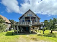 Charming Retreat with Screened Porch and Outdoor Shower - Cozy Haven