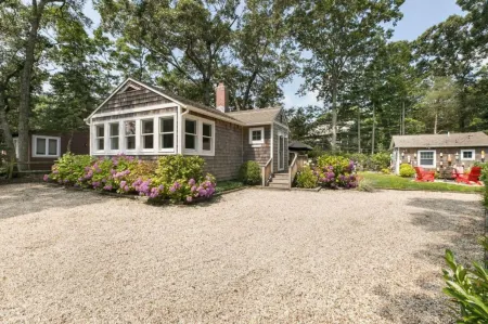 Stylish Patio and Firepit - Serene Beach Cottage Retreat