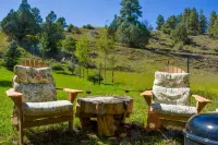 Charming Creekside Escape with Hot Tub and Two Kitchens - Cozy Haven