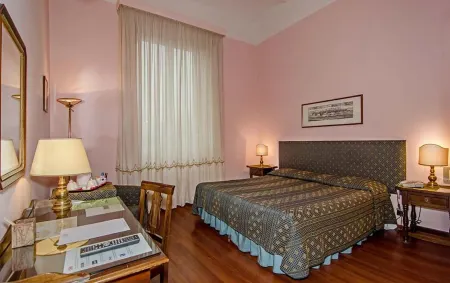 Hotel Rex Отели в г. Лукка